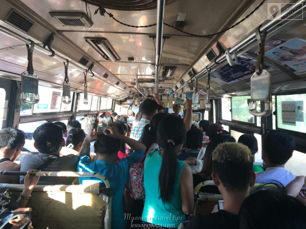 The local bus in Yangon is an old, hot, but extremely inexpensive bus ride.